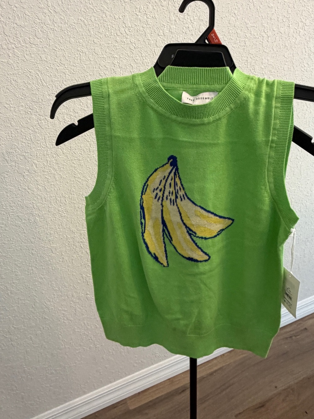 Sleeveless Green Banana Graphic Knit Top